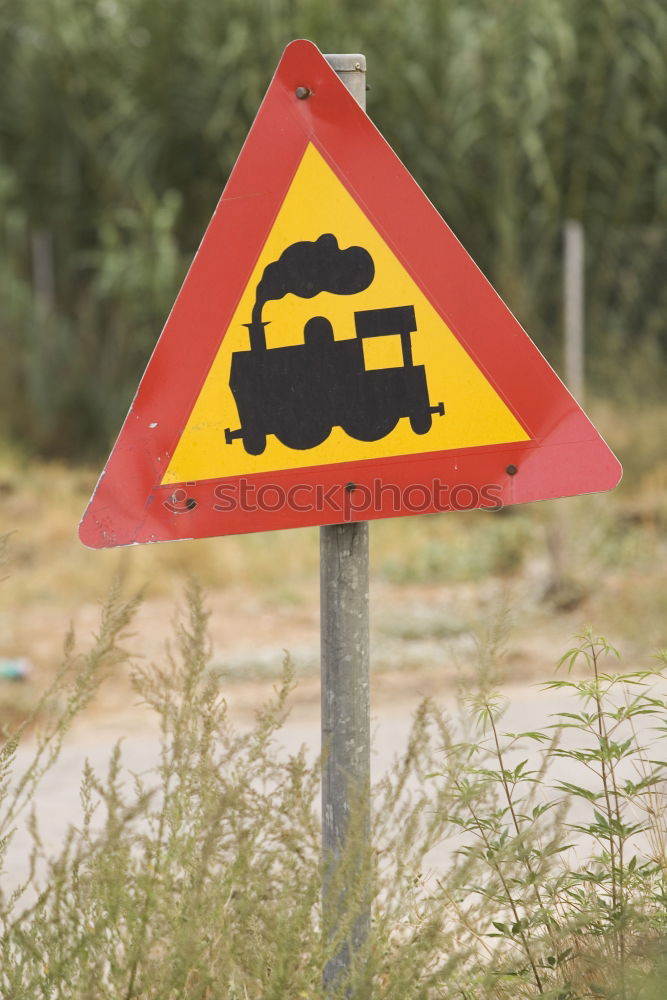 rolled gravel Road sign