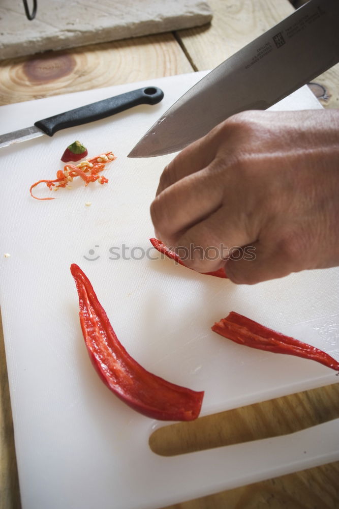 Similar – Sliced fresh carrots on a kitchen board