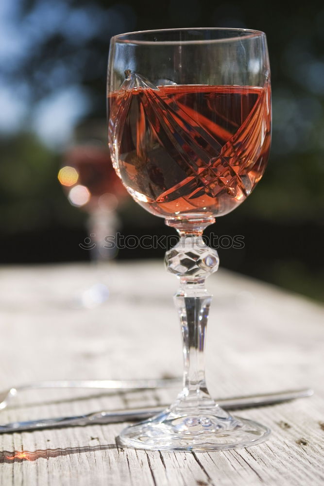 Similar – Glass of wine on wooden table