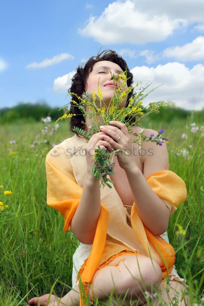 Similar – Image, Stock Photo Young woman with yellow dress and hat walks in the countryside.
