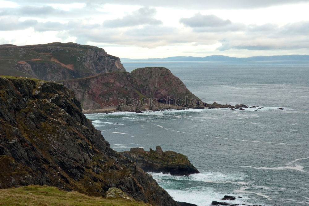 Similar – Coastal hills in dry grass