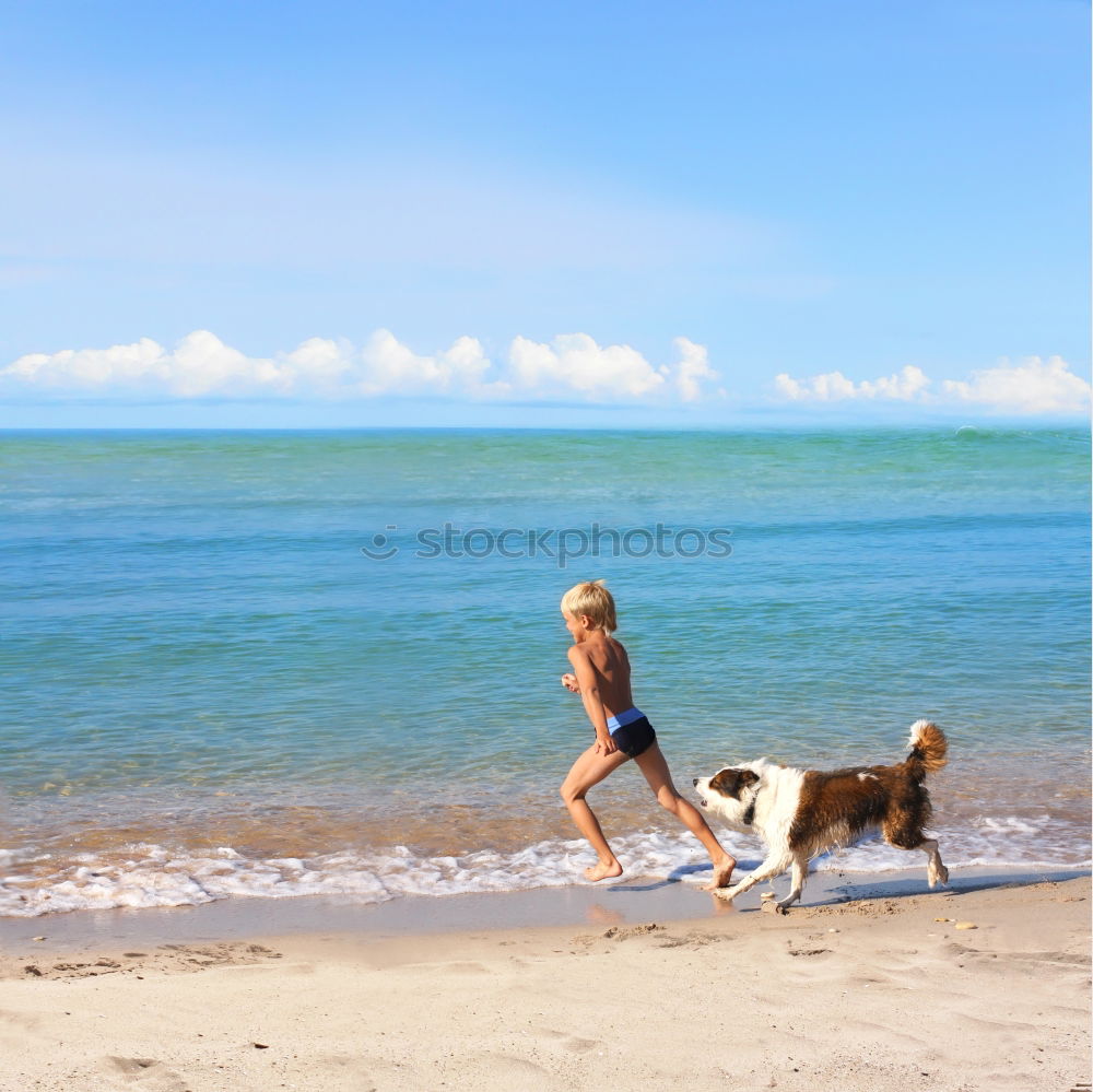 Similar – Image, Stock Photo Woman plays ball throwing with blond Labrador at Baltic Sea beach