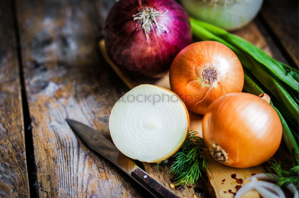 Similar – Image, Stock Photo female hands holding three red onions