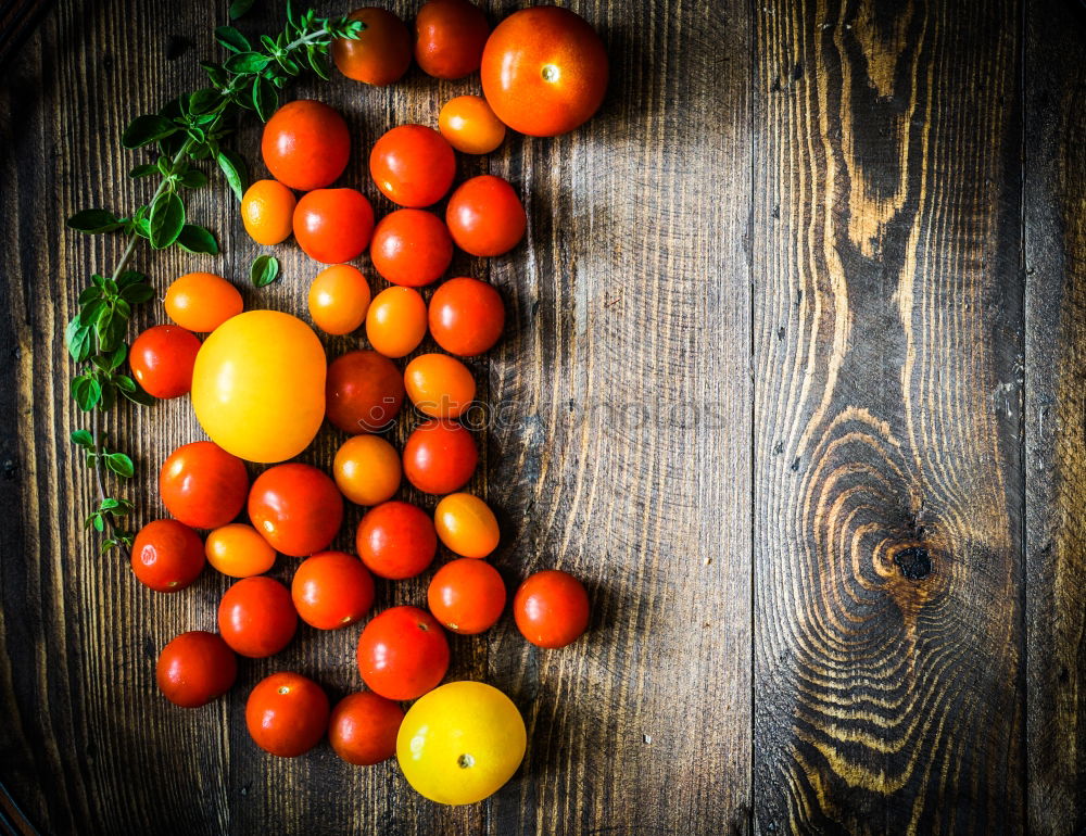 Similar – Image, Stock Photo cast iron round frying pan and ripe red cherry tomatoes