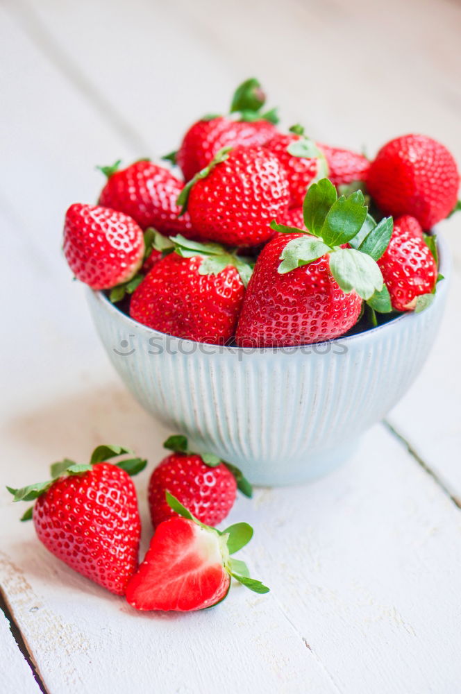 Similar – Strawberries in a bowl on an old wooden table