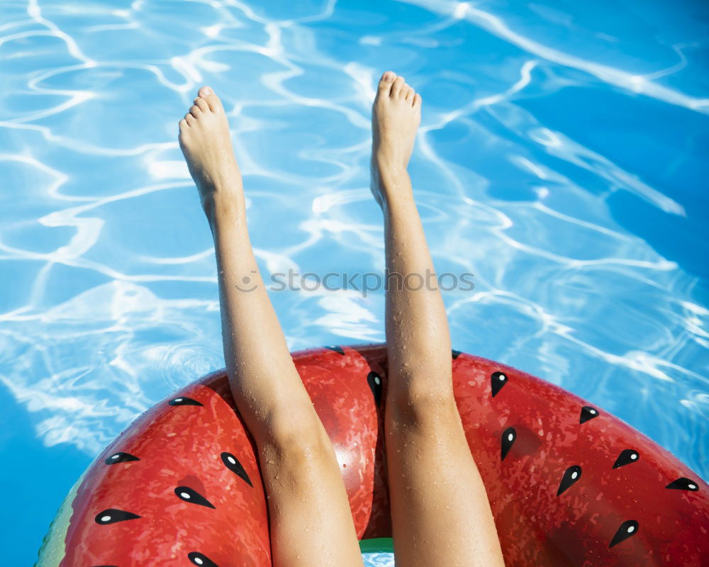 Similar – Image, Stock Photo Woman relaxing on inflatable ring in swimming pool