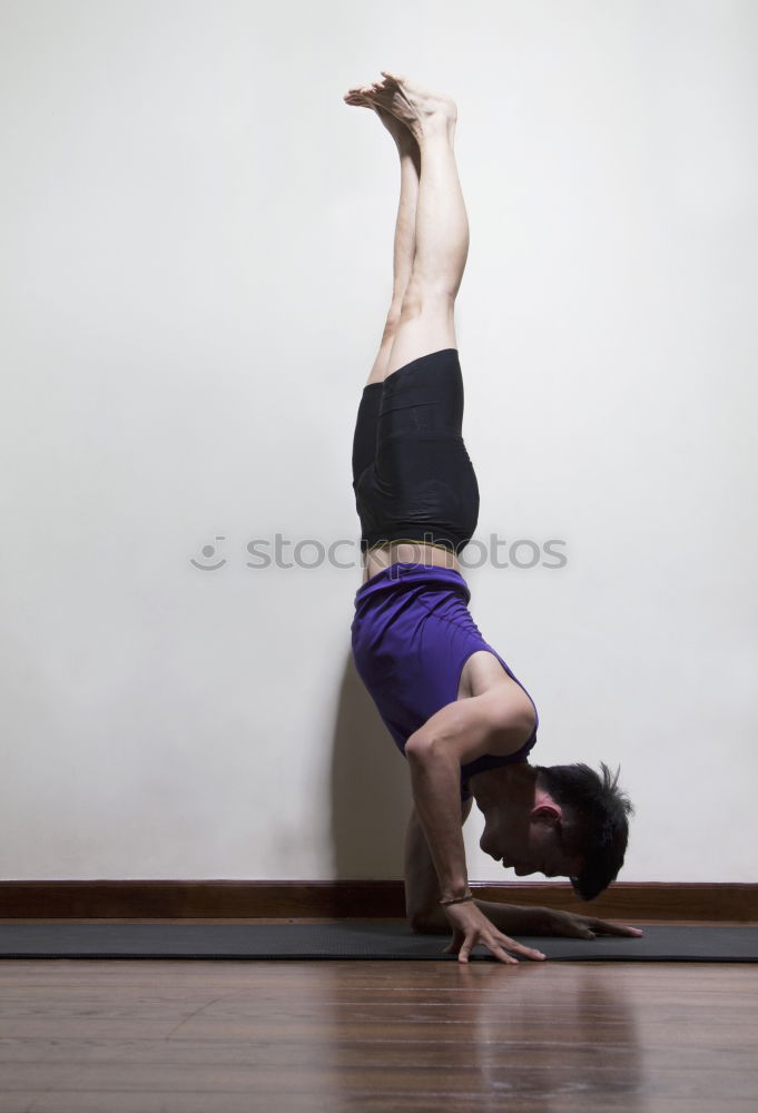 Similar – blumentopf Handstand