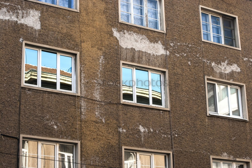 Similar – facade with rounding, plaster and brick