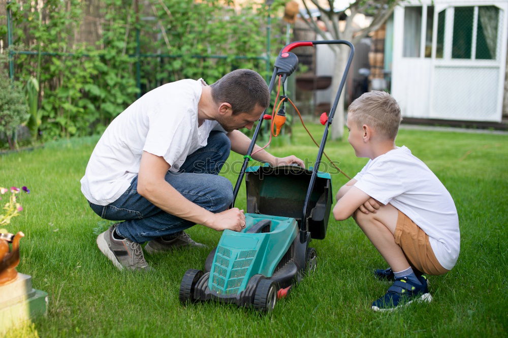 Similar – father and daughter fixing problems with bicycle