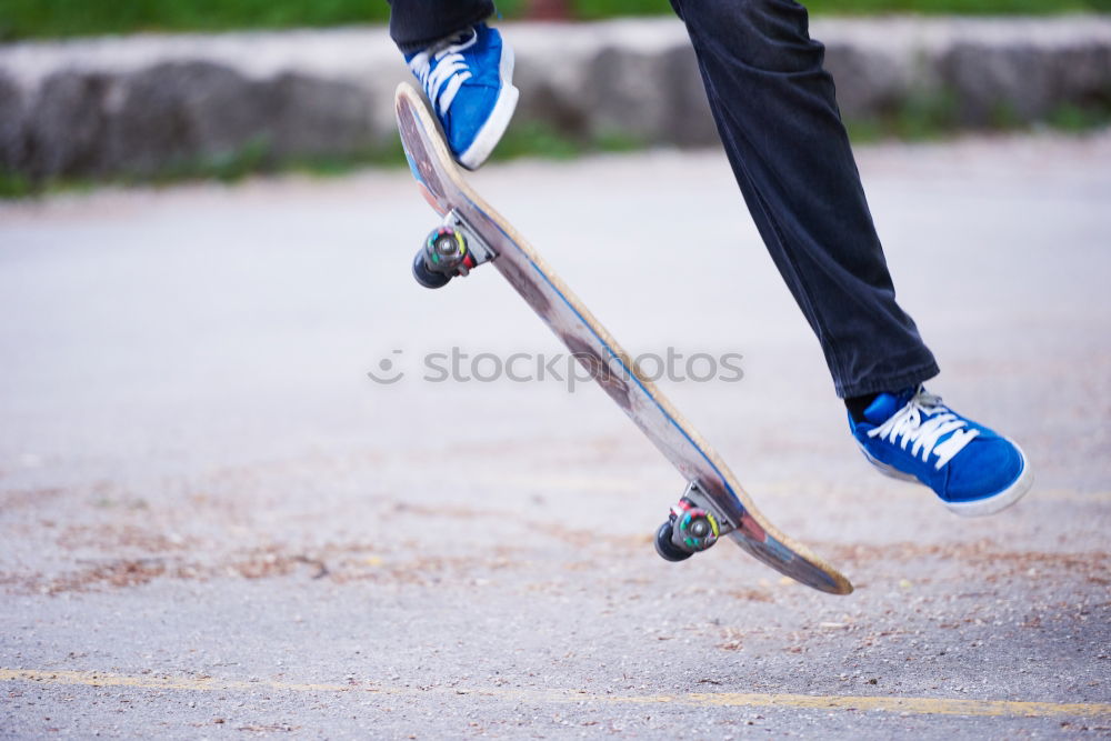 Similar – Person rides the skateboard