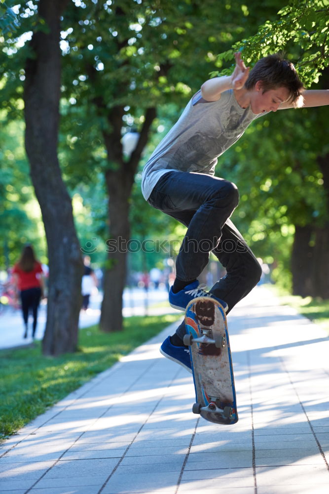 Similar – Image, Stock Photo Skateboarding woman practicing at skatepark