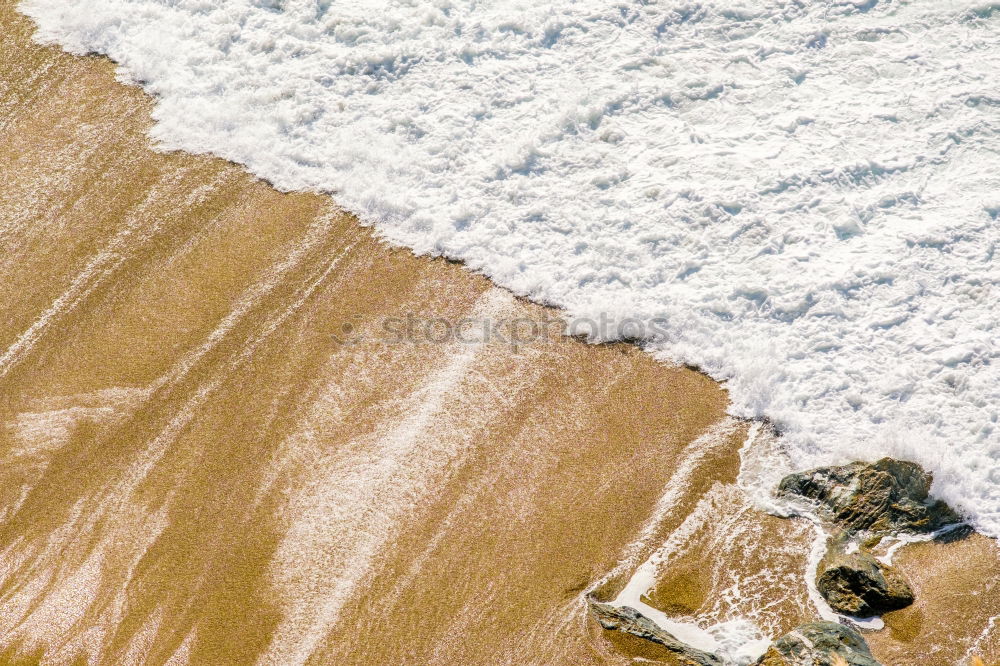 Similar – Beautiful aerial view of a beach with waves