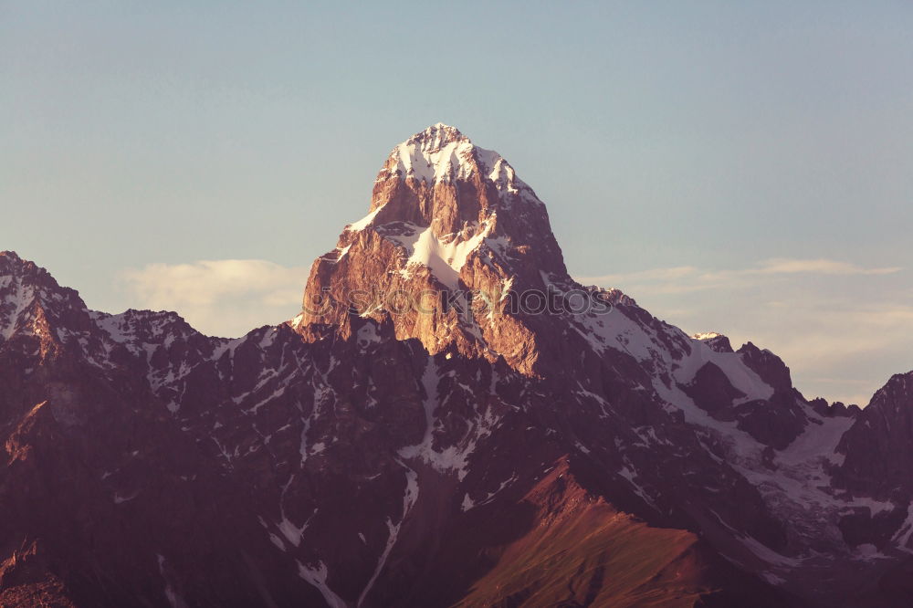 Similar – Picturesque view of snowy mountains