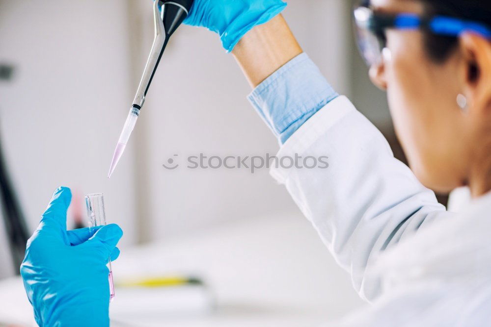 Similar – Image, Stock Photo Hands holding plastic test tube