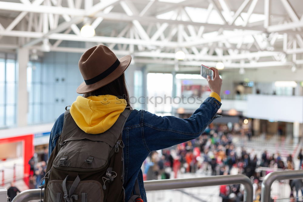 Cheerful tourist on train station