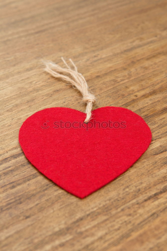 Similar – Image, Stock Photo Red heart shaped wooden sewing buttons on canvas