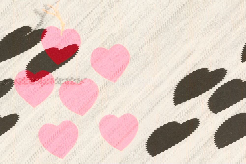Similar – Image, Stock Photo Valentine red hearts on grey wooden background