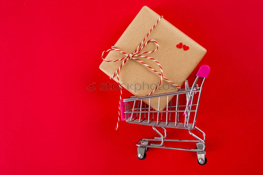 Similar – Paper bag full of black and red gifts