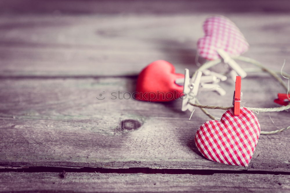 Similar – pair of red leather boxing gloves hanging on a nail