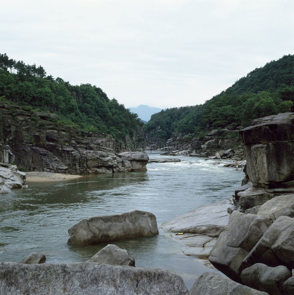 Similar – Mountain river valley landscape