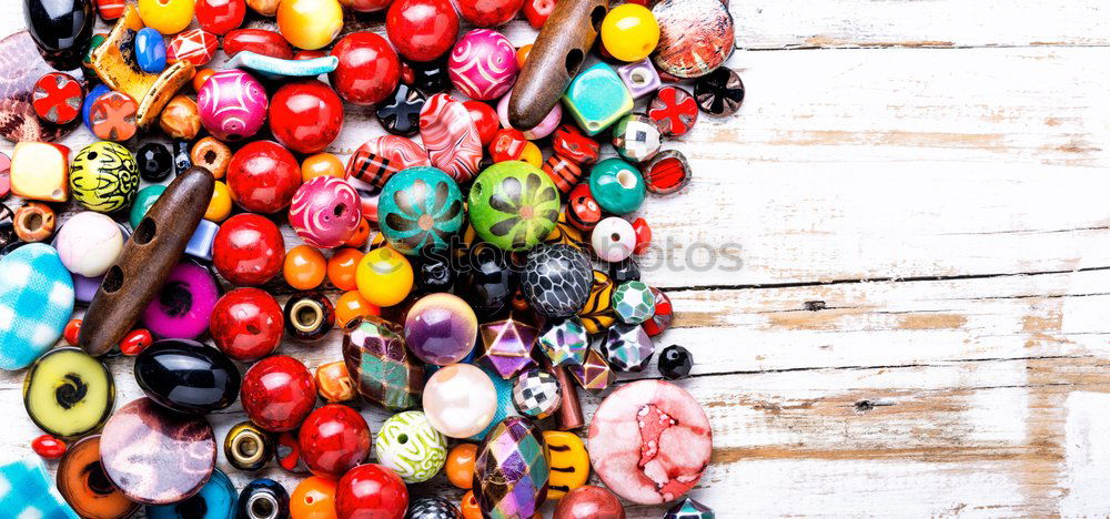 Similar – Image, Stock Photo Making necklaces of glass beads.