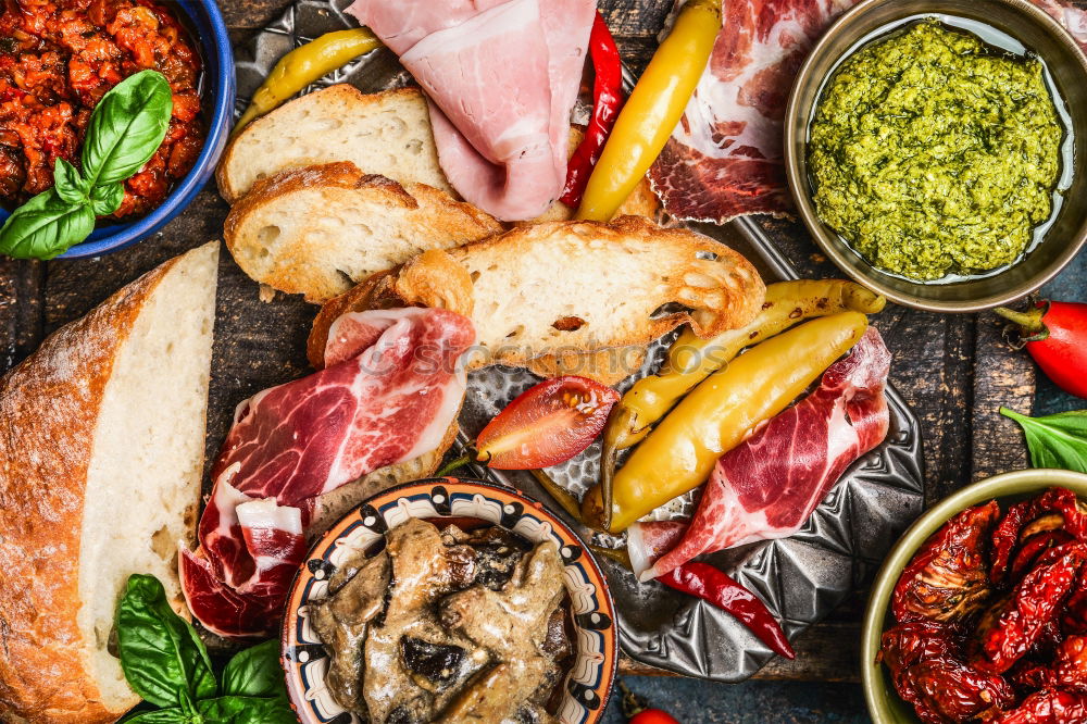 Similar – Italian meat platter with antipasti and ciabatta bread