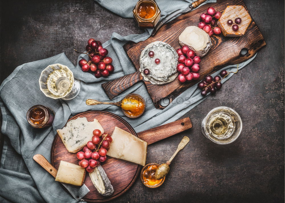 Similar – Image, Stock Photo Rustic cheese platter with various cheeses