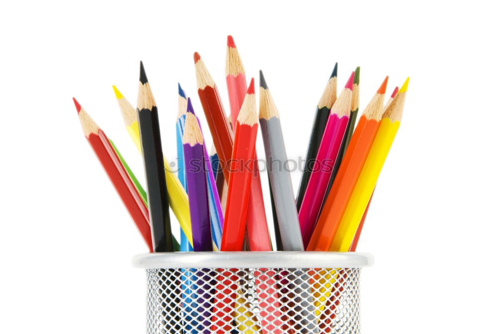 Variety, colourful pencils in a toy watering can