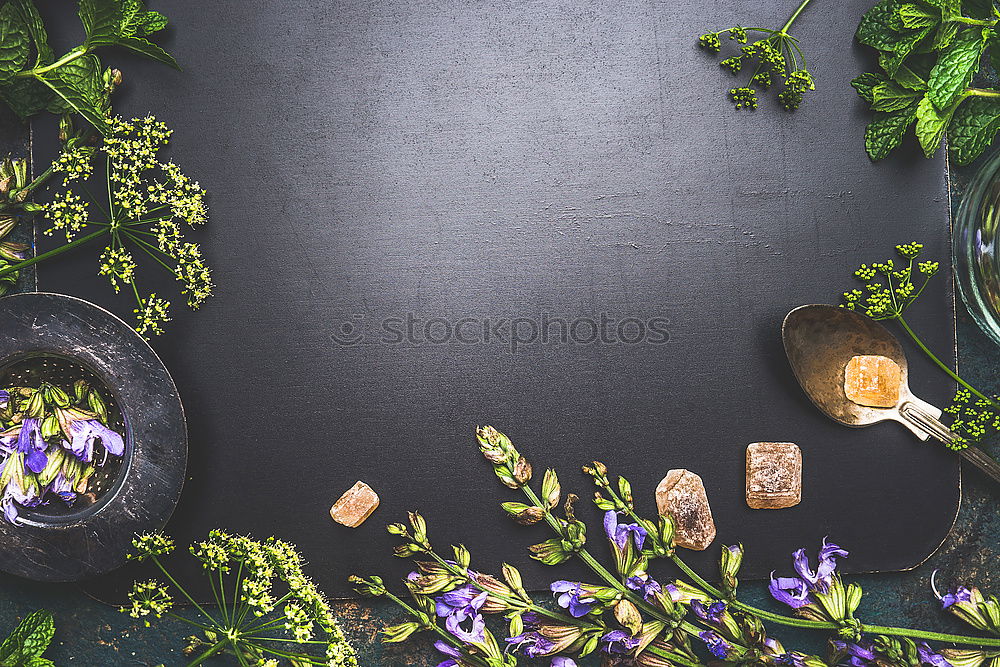 Cup of herbal tea on a dark background