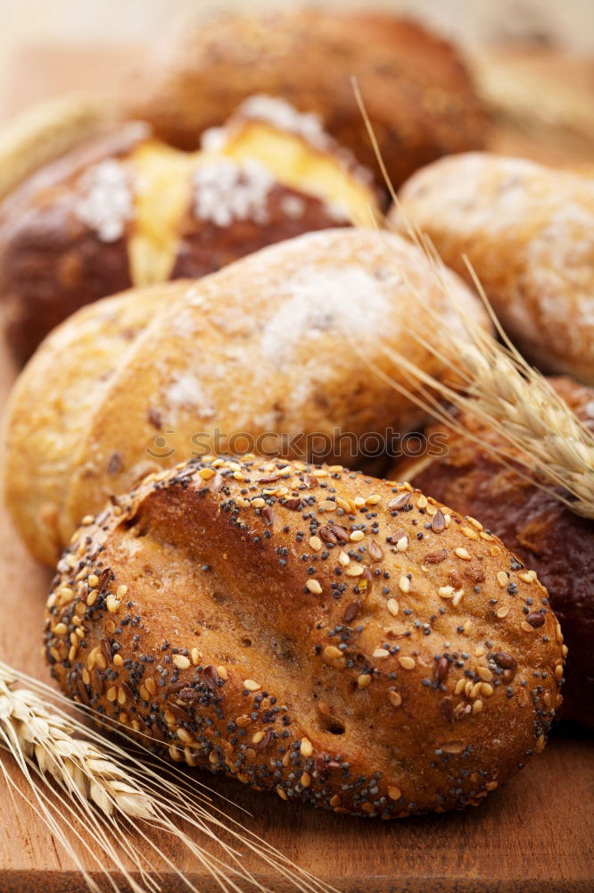 Similar – Many mixed breads and rolls.