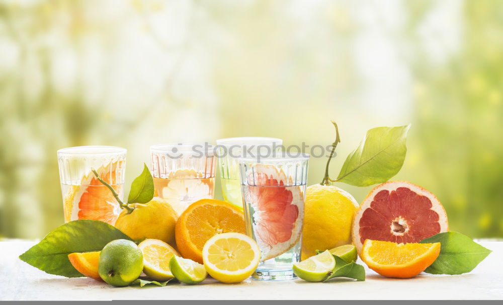 Similar – Image, Stock Photo A glass of soft drink with tangerine, cucumber and straw on white background