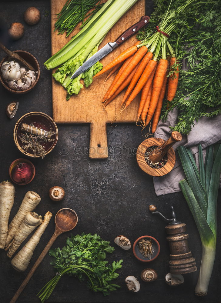 Similar – Image, Stock Photo Wild garlic pesto ingredients on dark rustic kitchen table