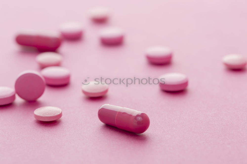 Similar – Pink tablets pill on blur blister pack of tablets pills on pink background. Prescription drugs. Woman health concept. Pharmaceutical industry. Online pharmacy banner. Drugs packaging. Treatment dose.