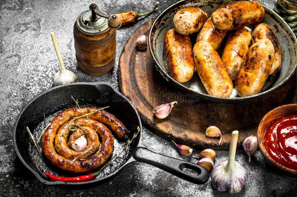 Similar – Bratwurst with mashed potatoes and sauerkraut