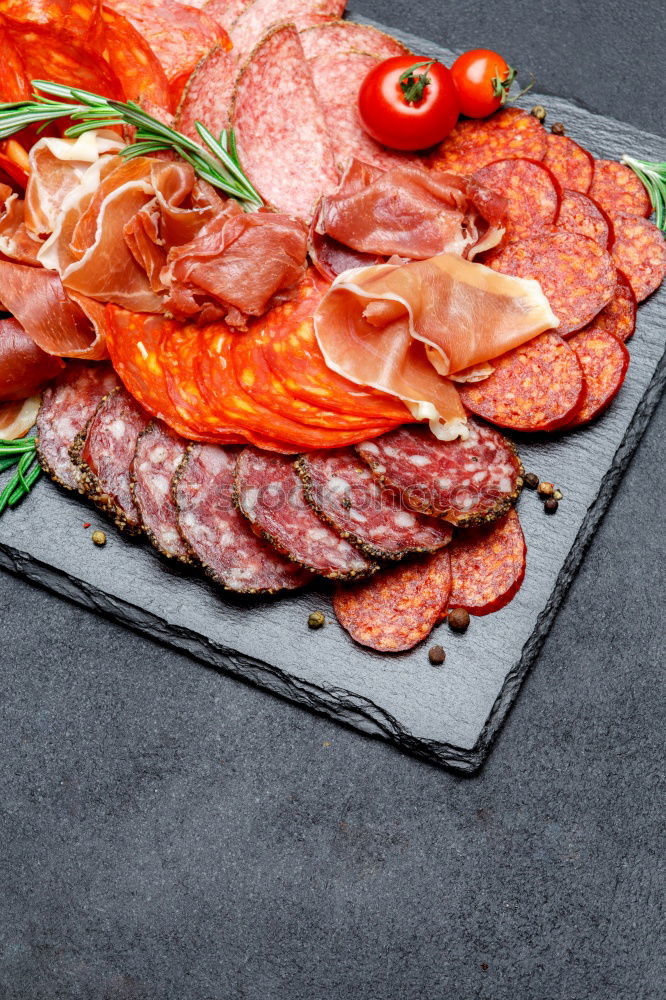 Similar – Image, Stock Photo Bruschetta with Italian sausage, ham and pesto