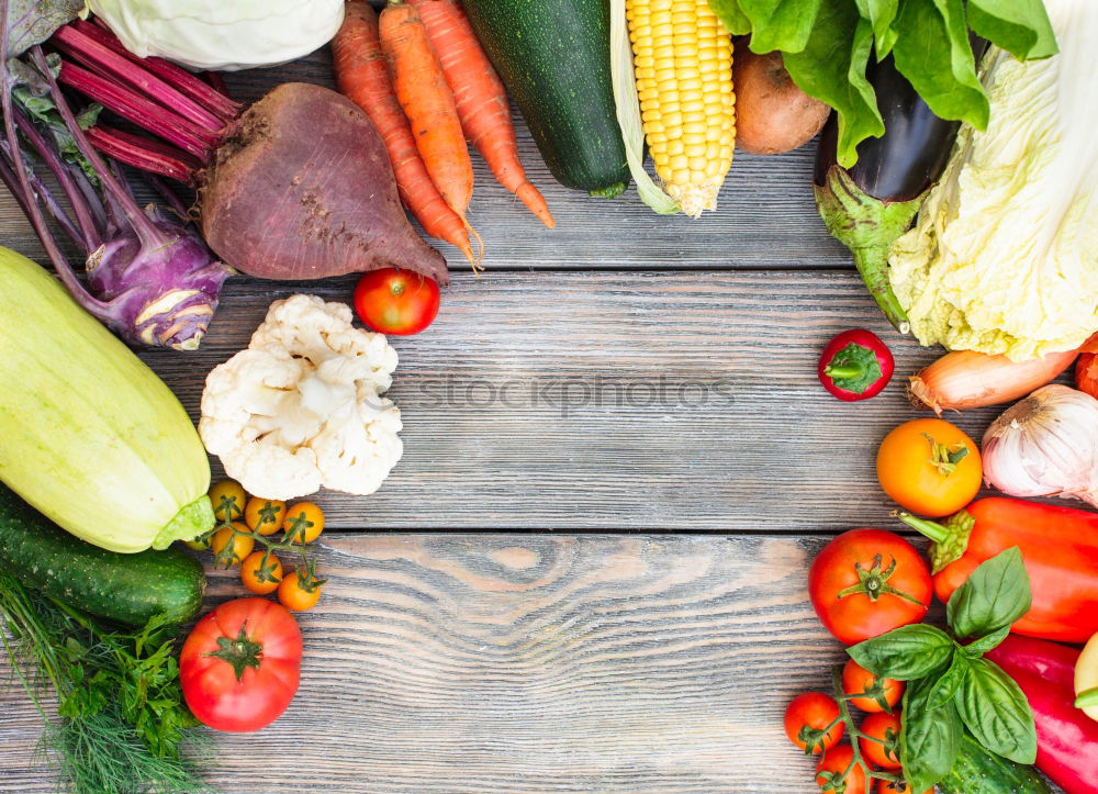 Similar – Vegetables and utensils on kitchen table