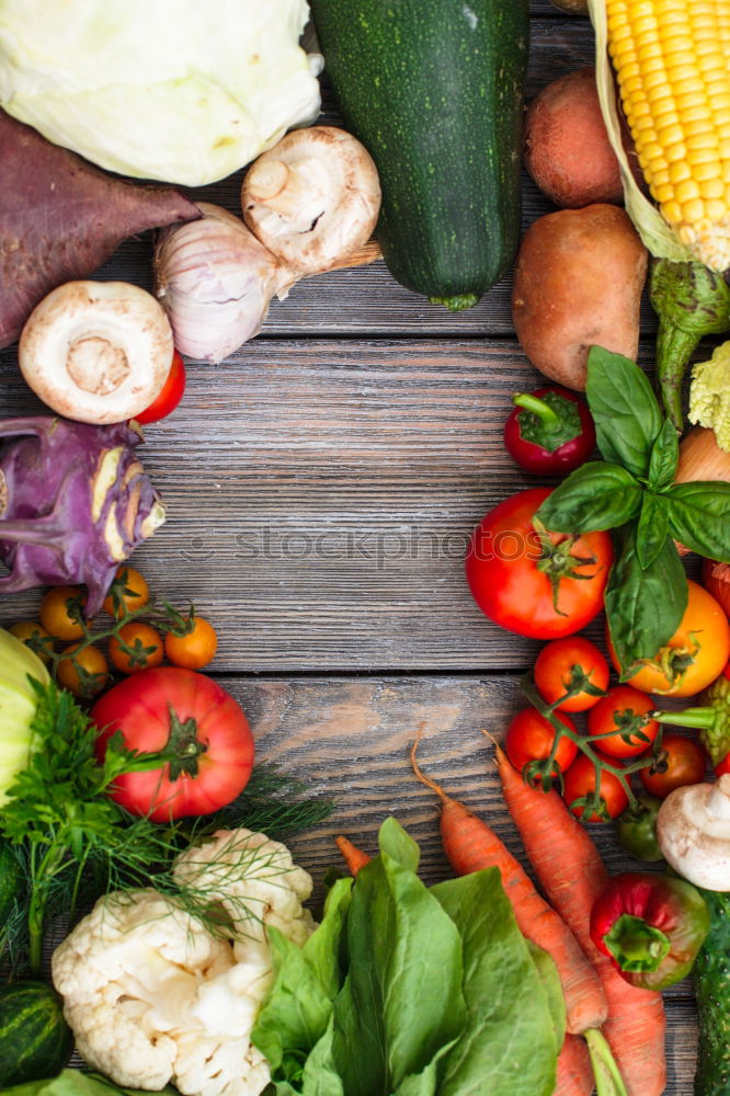 Similar – Vegetables and utensils on kitchen table