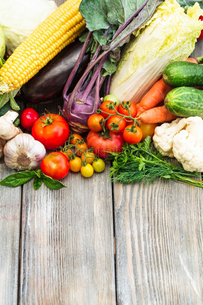 Similar – Vegetables and utensils on kitchen table