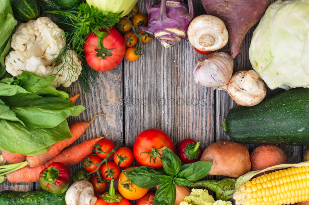 Similar – Vegetables and utensils on kitchen table