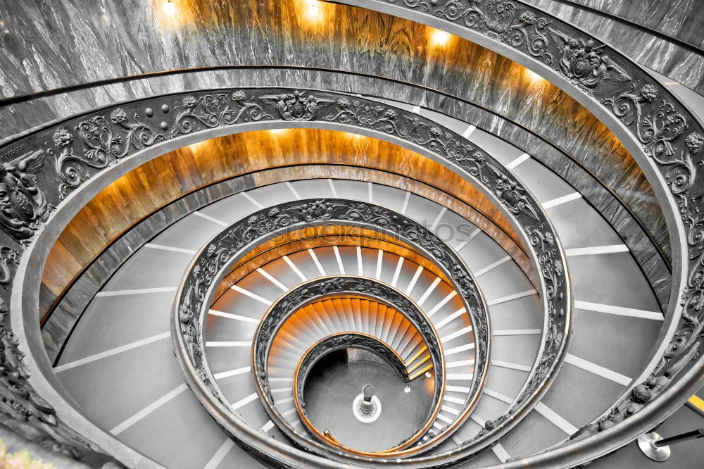 Similar – Top view of a spiral staircase in an old building