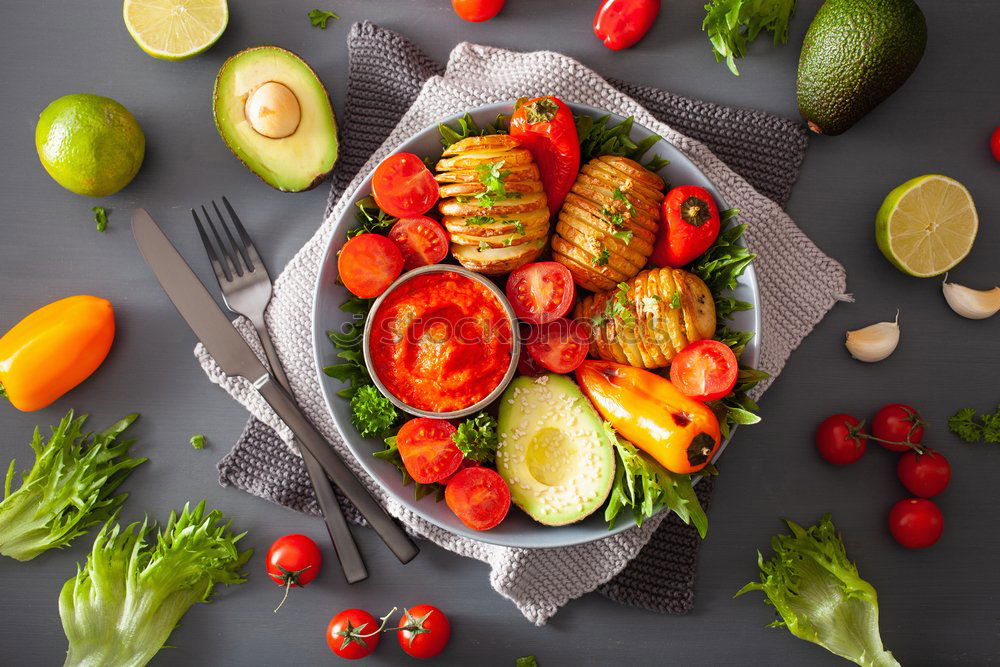 Similar – Vegetables and utensils on kitchen table