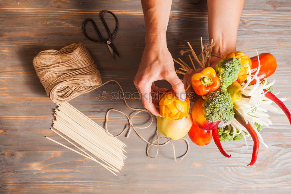 Similar – process of slicing carrots on slices on a kitchen board