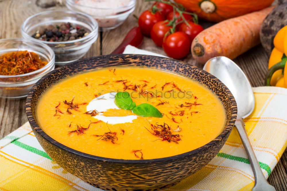 Similar – Fresh pumpkin soup in three bowls on a wooden table