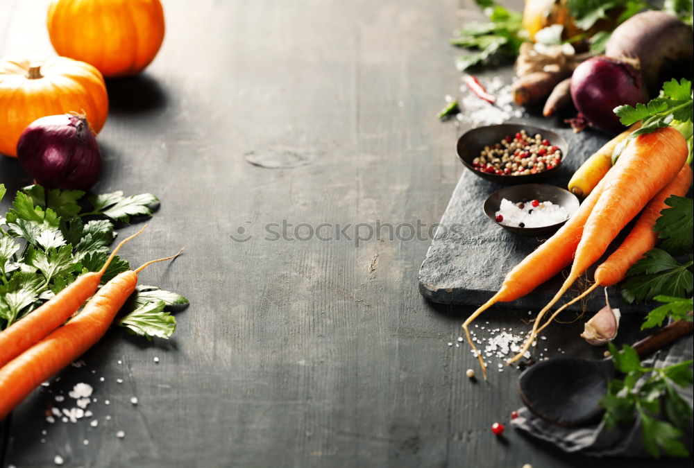 Similar – Two female hands chopped fresh carrot slices