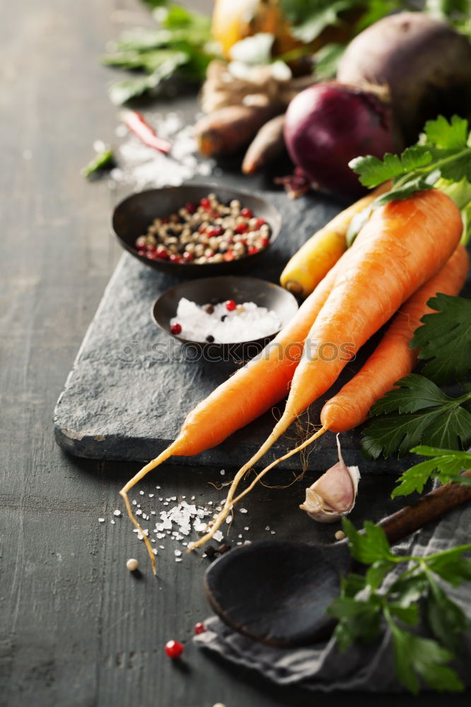 Similar – Fresh carrots and onions on a gray wooden table