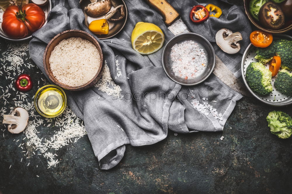 Similar – Home breakfast preparation with bagel bread, salmon, avocado , fresh cheese, hummus and cooked quail eggs on dark rustic wooden background, top view. Copy space for your design, banner