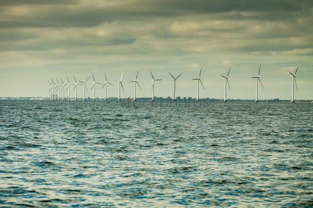 Similar – Image, Stock Photo Wind power plants in the morning haze