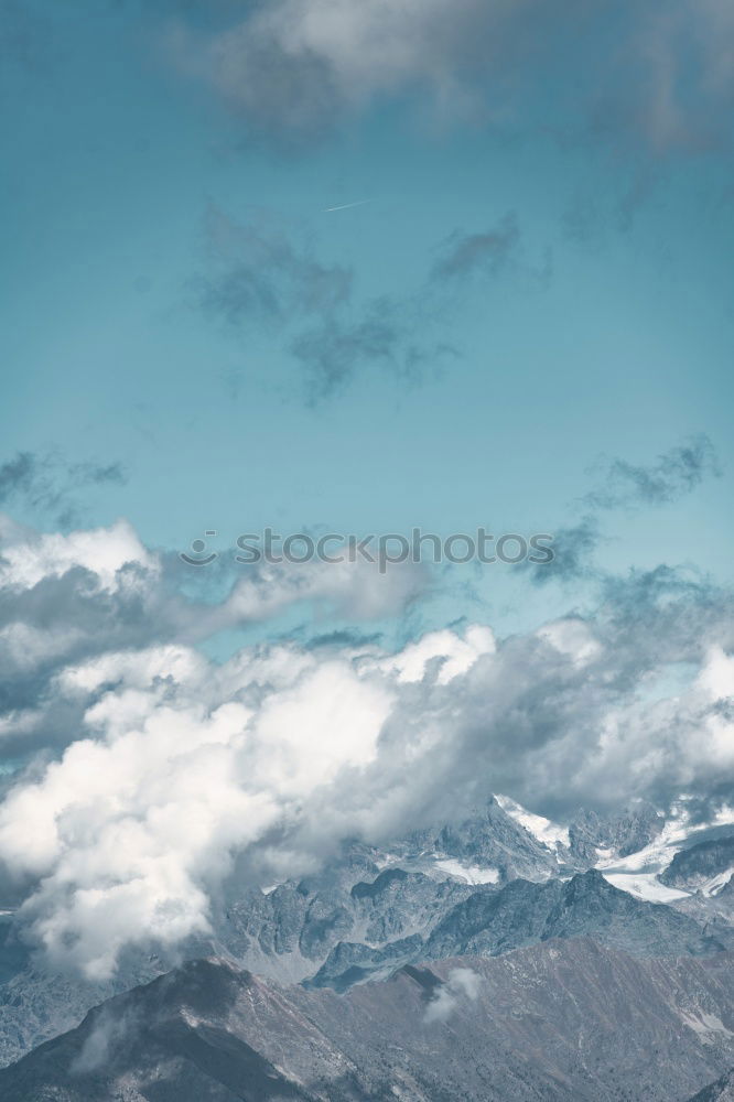 Similar – Image, Stock Photo Clouds and shadows in the Dolomites portrait