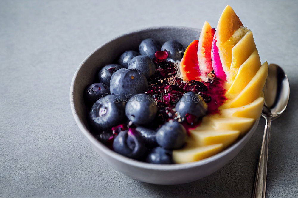 Similar – Acai bowl strawberry blueberry banana wooden table