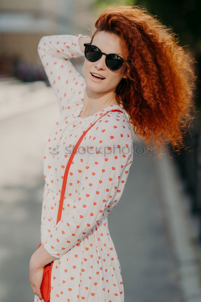 Similar – Young redhead photographer woman